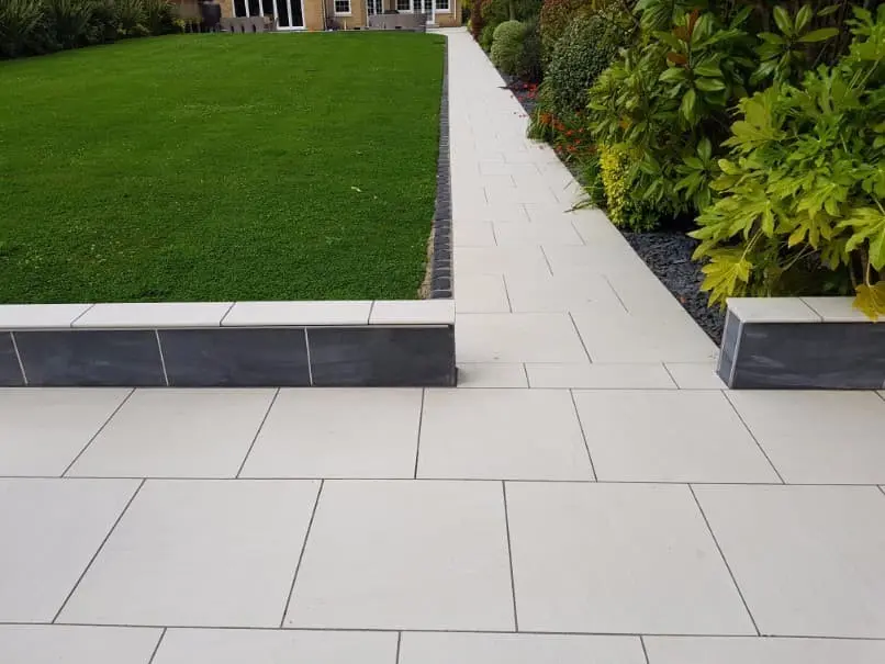 Paths in the country from paving slabs: paving technology + photos of successful design ideas for garden paths