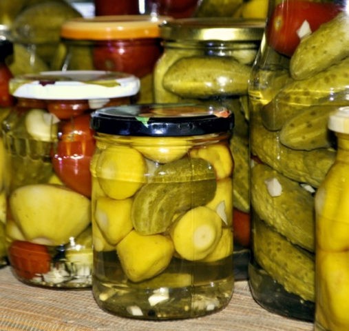 Pickled assorted cucumbers, tomatoes and squash: canning recipes for the winter