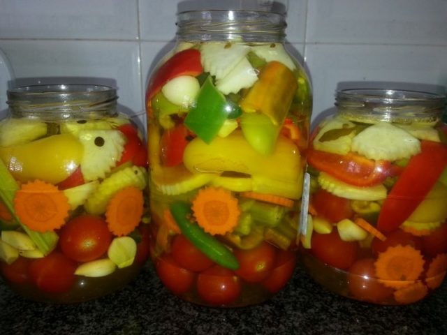 Pickled assorted cucumbers, tomatoes and squash: canning recipes for the winter