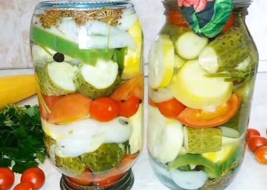 Pickled assorted tomatoes with cucumbers, zucchini, cabbage