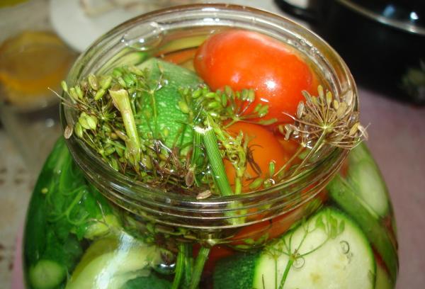 Pickled assorted tomatoes with cucumbers, zucchini, cabbage