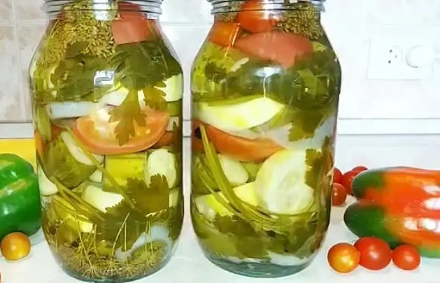 Pickled assorted tomatoes with cucumbers, zucchini, cabbage