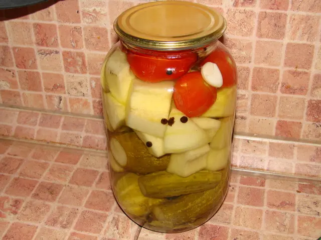 Pickled assorted tomatoes with cucumbers, zucchini, cabbage