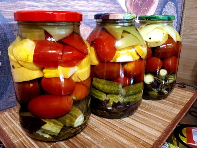 Pickled assorted tomatoes with cucumbers, zucchini, cabbage