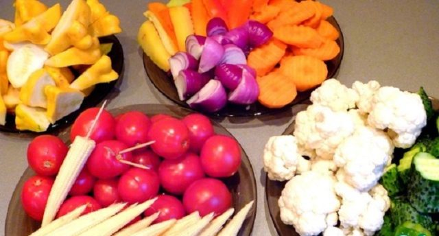 Pickled assorted tomatoes with cucumbers, zucchini, cabbage