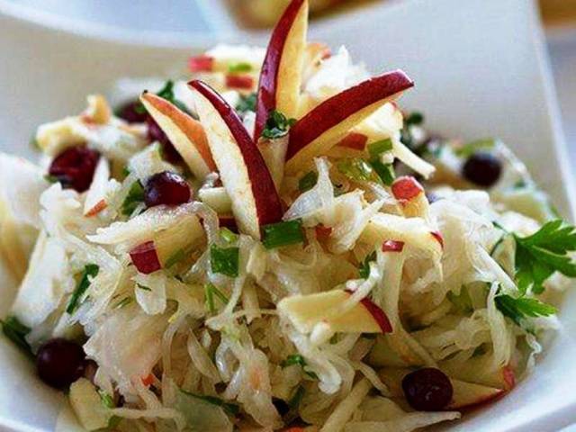 Pickled cabbage in jars with vinegar