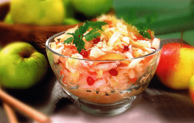 Pickled cabbage in jars with vinegar