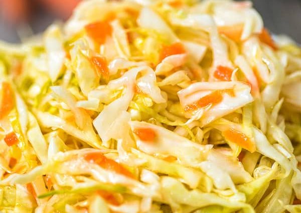 Pickled cabbage with garlic, butter and carrots