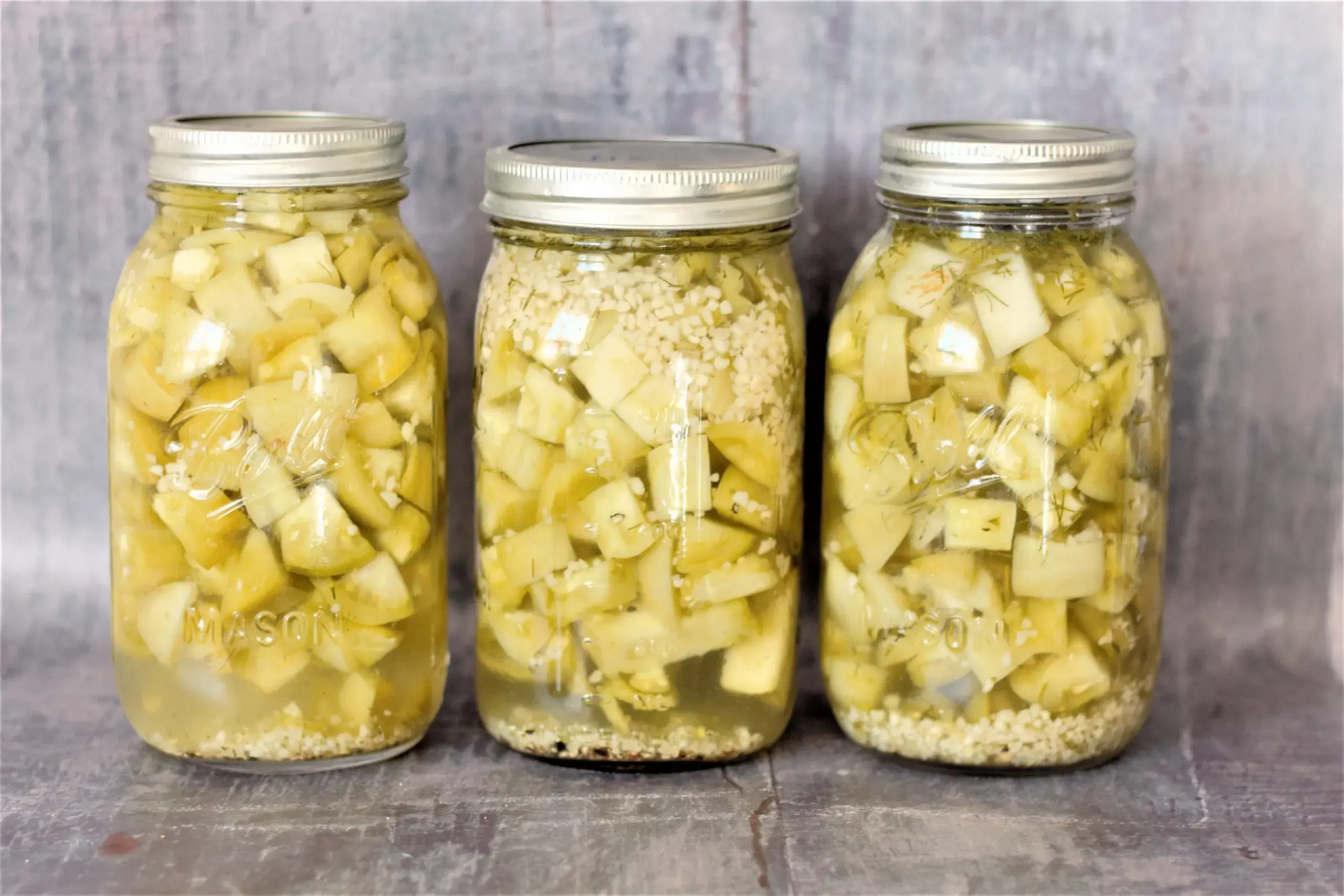 Pickled green tomatoes for the winter: step-by-step recipes for instant Korean-style tomatoes with garlic, in jars