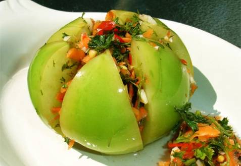 Pickled green tomatoes with hot peppers