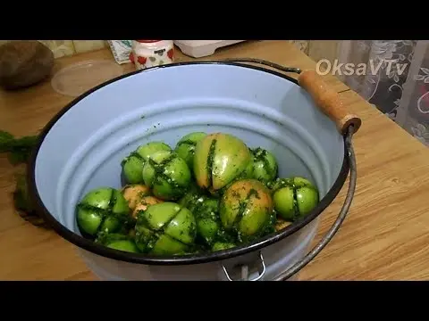 Pickled green tomatoes with hot peppers