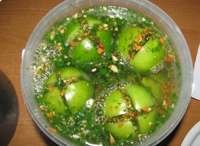 Pickled green tomatoes with stuffing