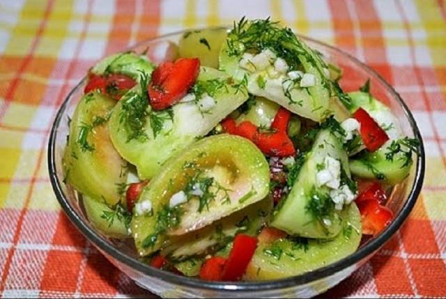 Pickled instant green tomatoes in a pot