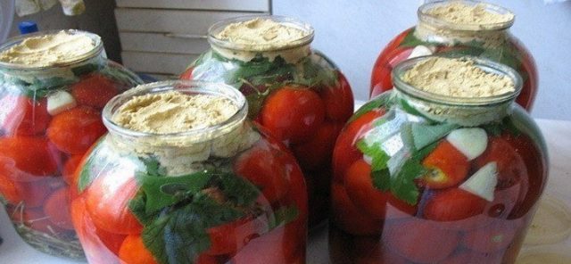 Pickled tomatoes for the winter in jars