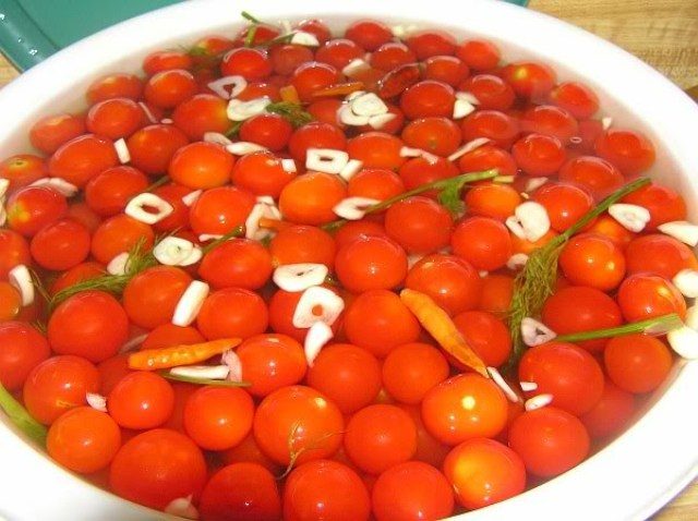 Pickled tomatoes for the winter in jars