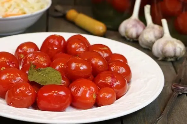 Pickled tomatoes for the winter in jars