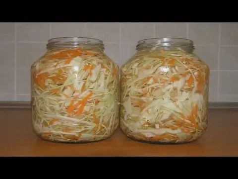 Pickling cabbage in jars in brine 