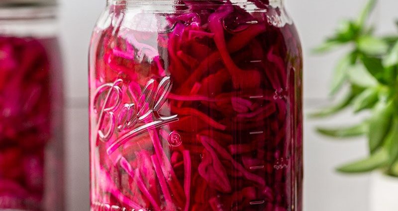 Pickling cabbage in jars in brine 