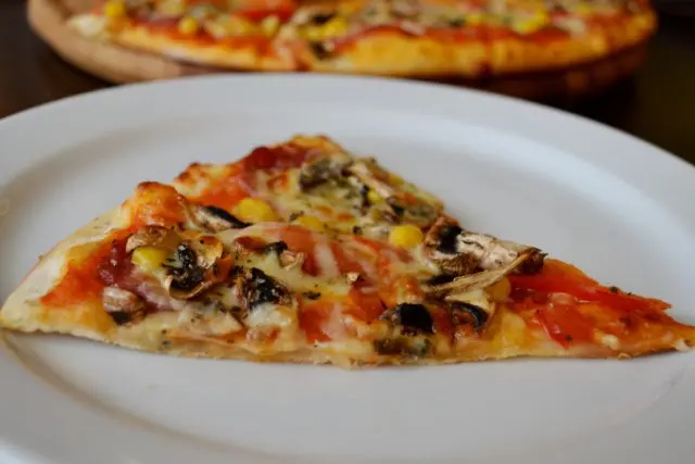 Pizza with mushrooms: cooking recipes with photos at home