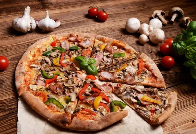 Pizza with mushrooms: cooking recipes with photos at home