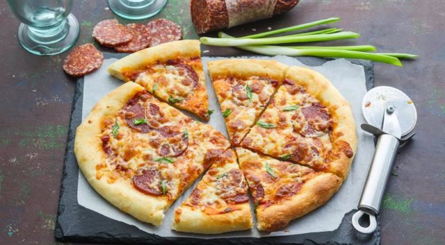 Pizza with mushrooms: cooking recipes with photos at home