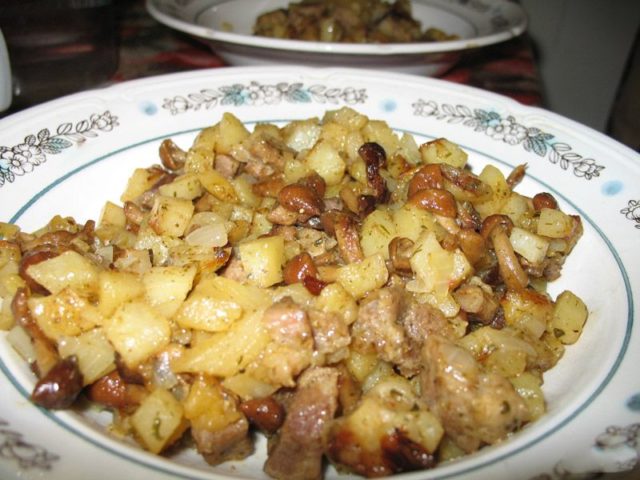 Pork with mushrooms: in a pan, in the oven, in a slow cooker