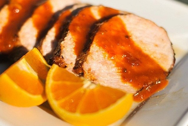 Pork with oranges baked in the oven: in foil, with sauce