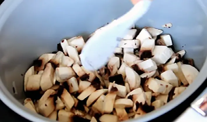 Potatoes with champignons cooked in a slow cooker