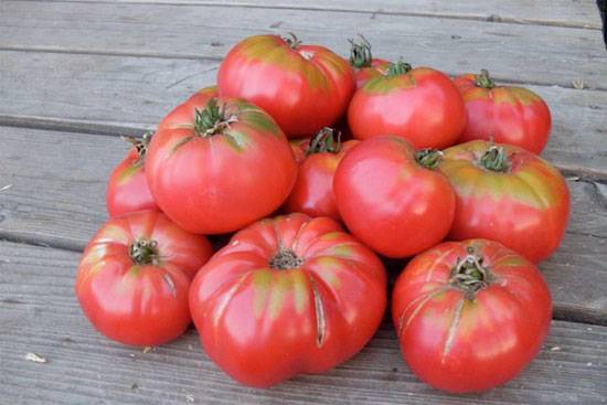 Raspberry giant tomato: reviews, yield