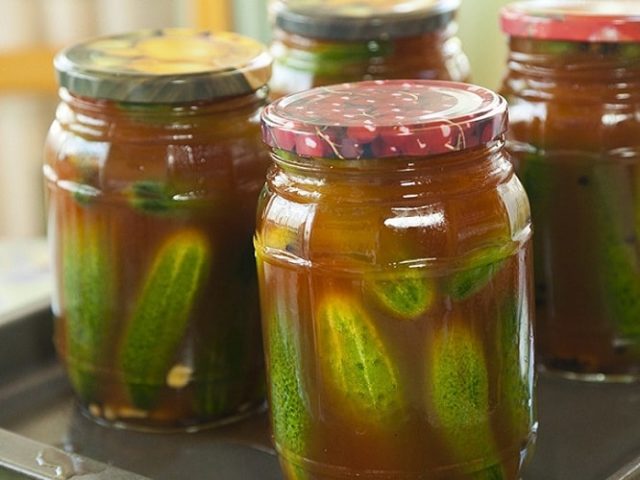 Recipes for cucumbers in tomato juice for the winter: pickling and canning rules