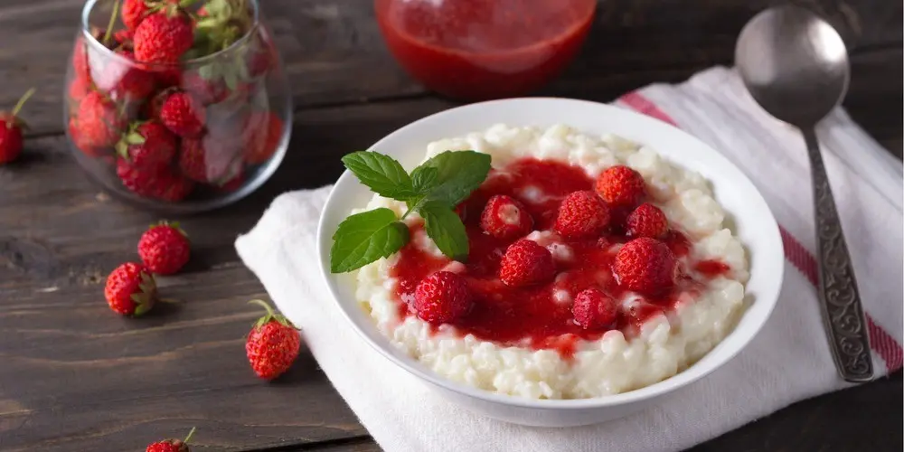 Rice pudding with strawberry mousse. A healthy and nutritious breakfast