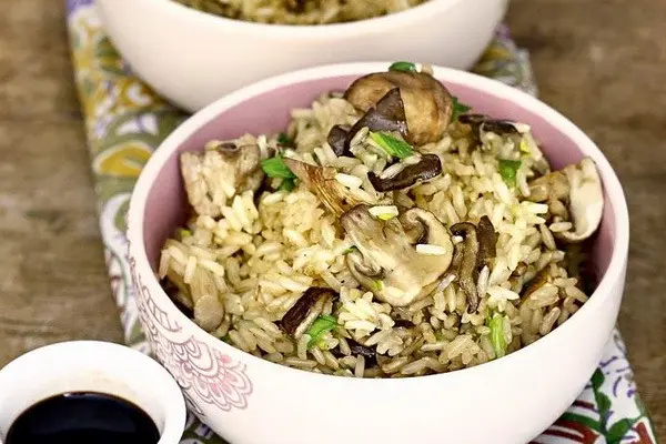 Rice with meat and mushrooms: recipes for the oven and slow cooker