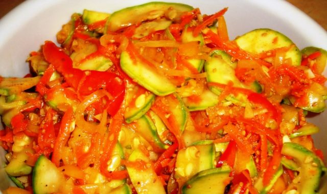 Salads from cucumbers, zucchini and peppers for the winter: recipes with photos at home