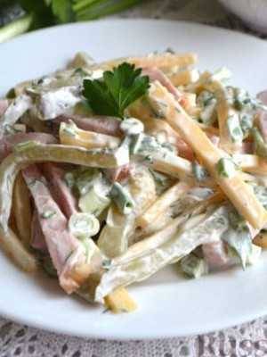 Salads with champignons and ham for the festive table