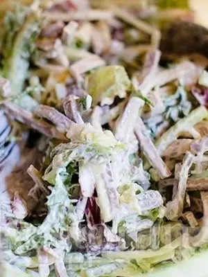 Salads with champignons and ham for the festive table