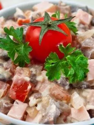 Salads with champignons and ham for the festive table