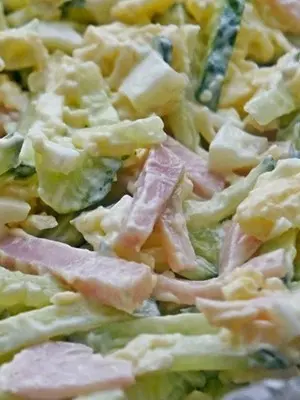 Salads with champignons and ham for the festive table