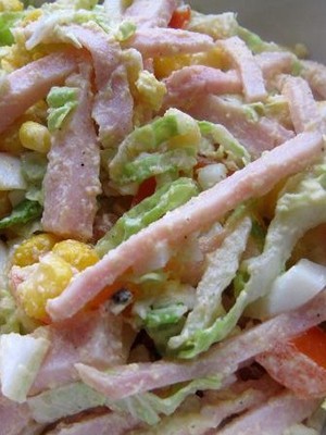 Salads with champignons and ham for the festive table