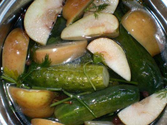 Salted cucumbers in hot brine