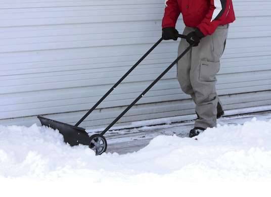 Snow scraper on wheels