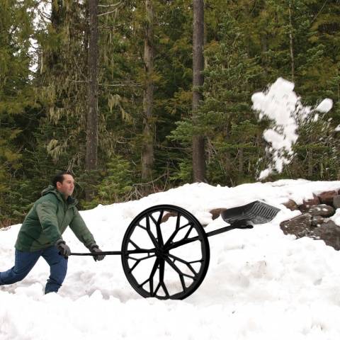 Snow scraper on wheels