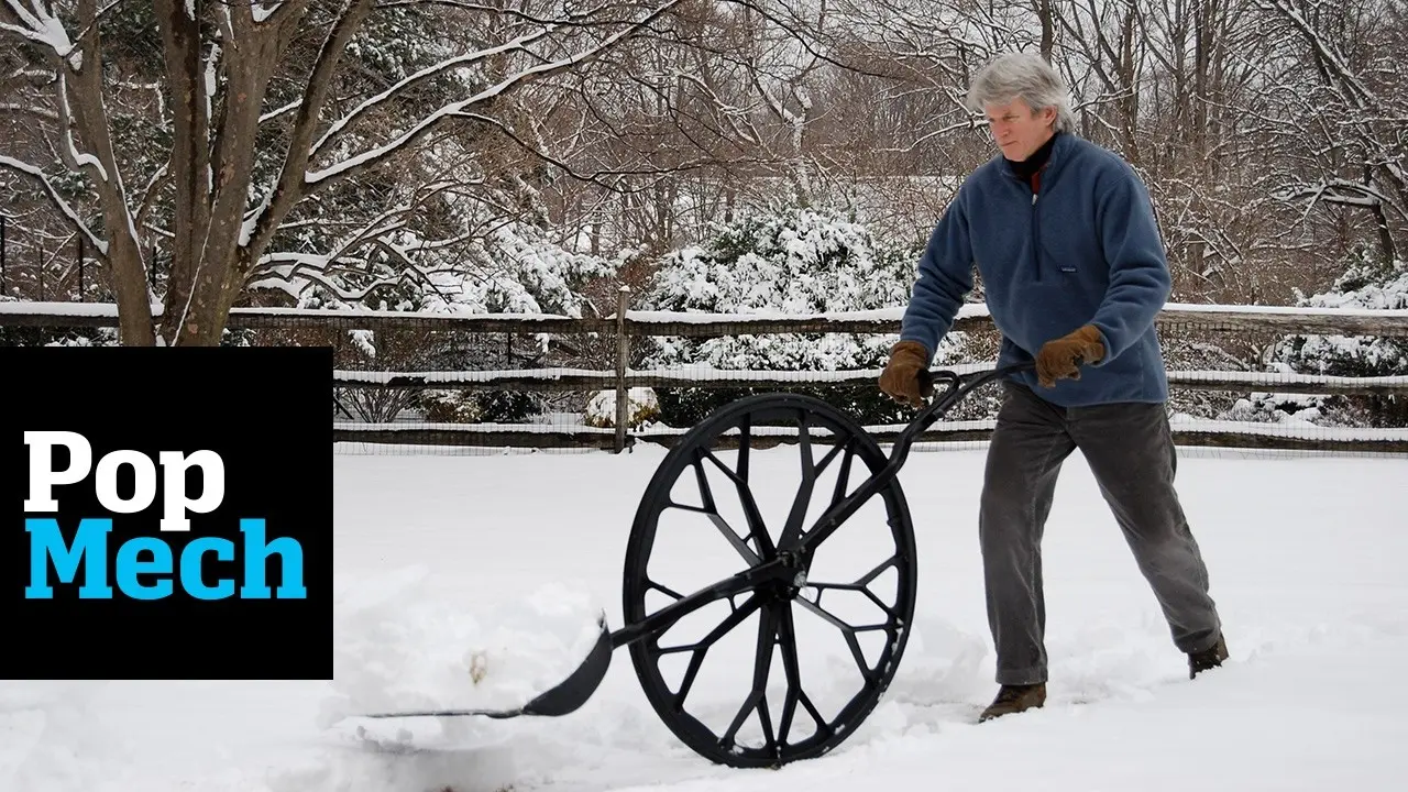 Snow scraper on wheels