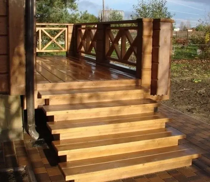 Stairs to the veranda made of wood or metal, a step-by-step construction guide from the frame to the steps, photo projects