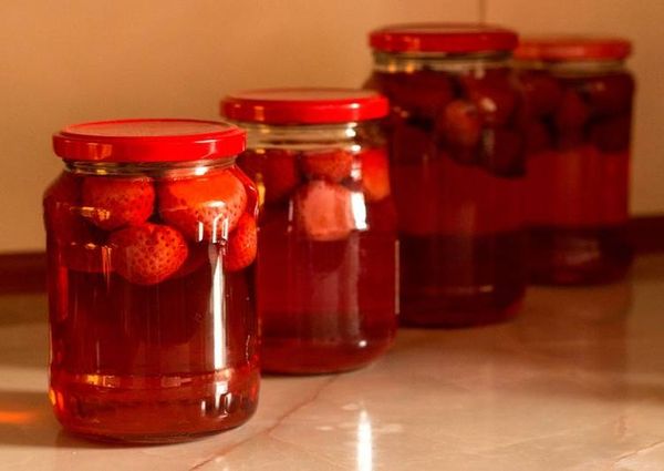 Strawberry compote: healthy harvesting of berries for the winter, delicious homemade recipes for a strawberry drink in jars, a slow cooker