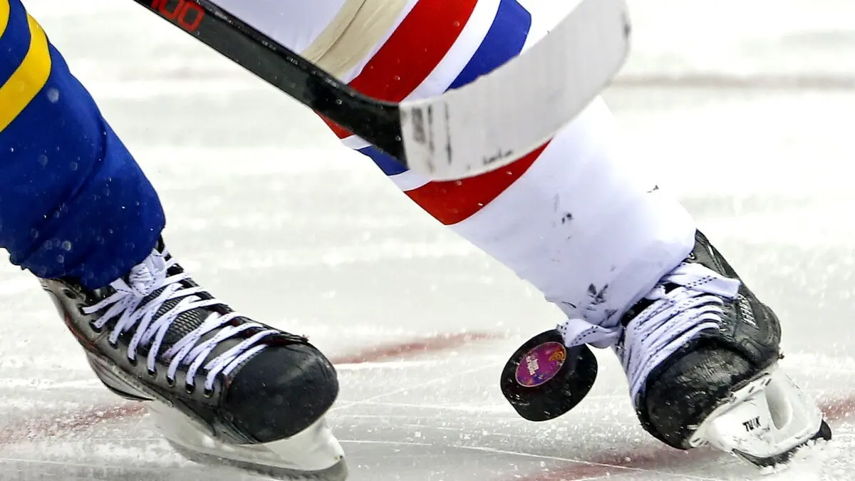 Super carrier at a hockey game. CDC warns against indoor sports