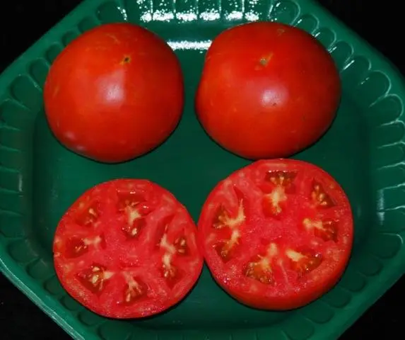 Superdeterminant tomato varieties