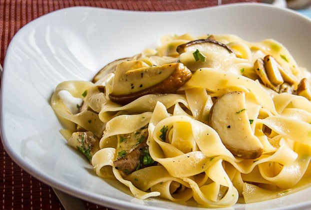 Tagliatelle with porcini mushrooms in a creamy sauce