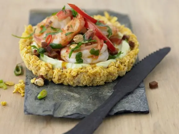 Tartlets with avocado and shrimps, cheese, fish