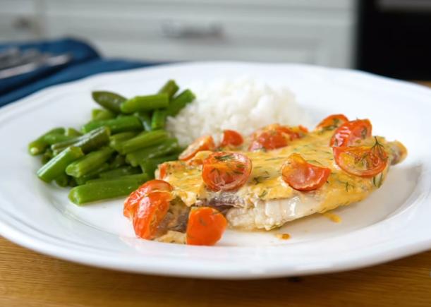 Tilapia baked with vegetables in the oven: under cheese, in foil, in cream sauce