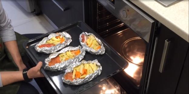 Tilapia baked with vegetables in the oven: under cheese, in foil, in cream sauce